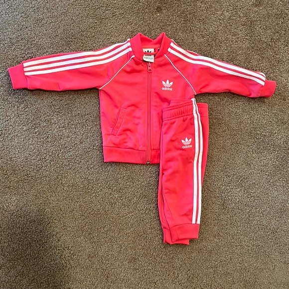 Two adidas track suits and two pairs of shell toes